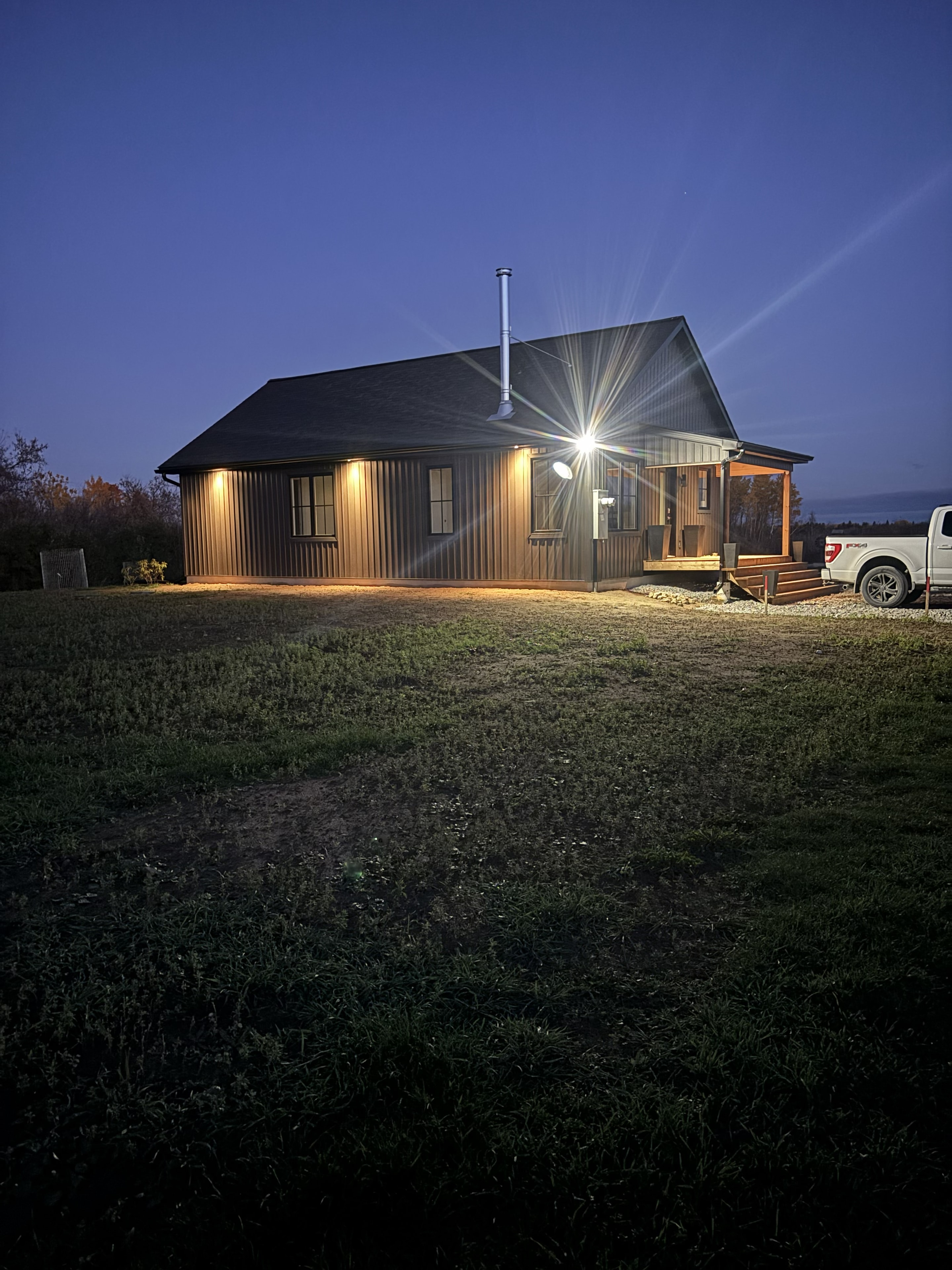 Exterior architectural lighting at dusk